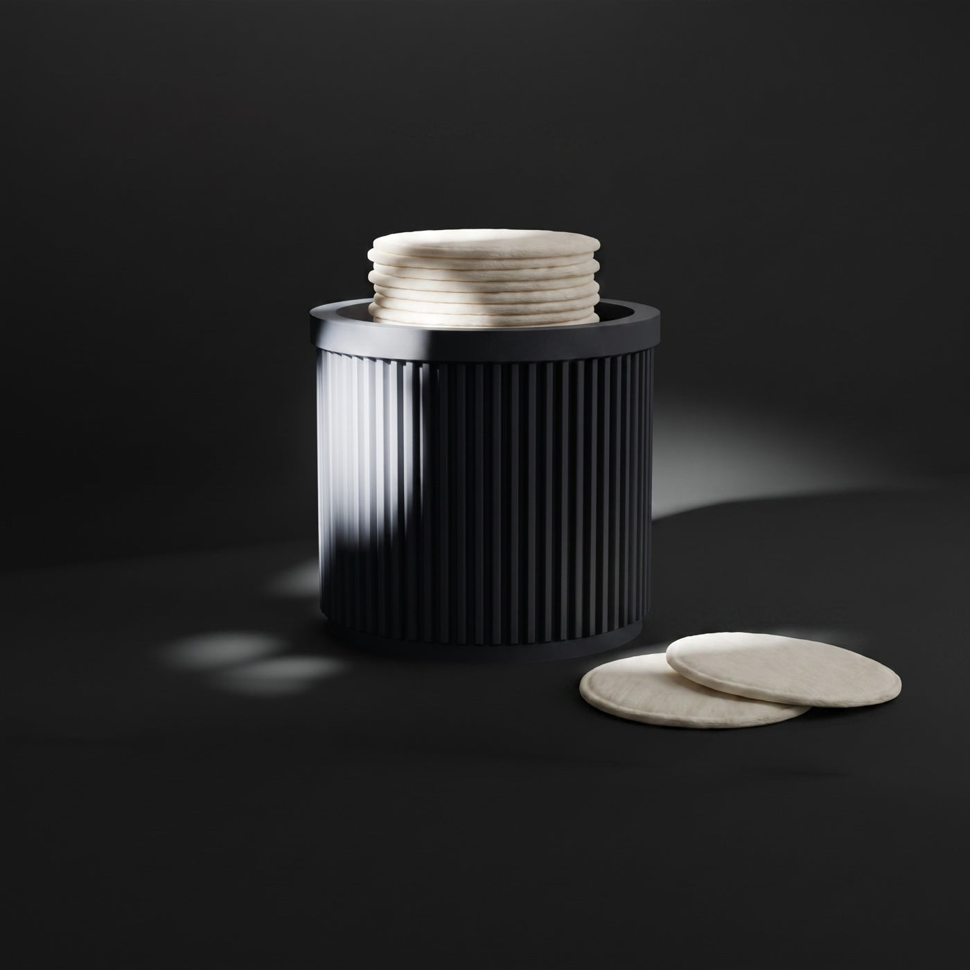 Ribbed pot stacked with cotton pads